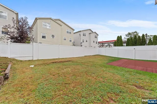 a view of a big room with table and chairs