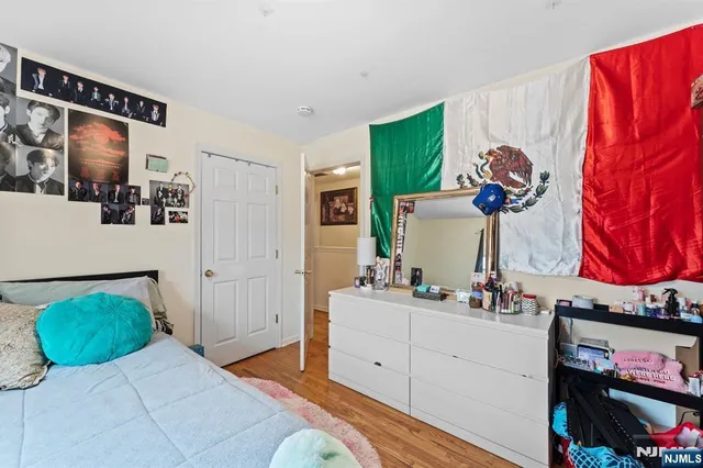 a bedroom with a bed and furniture