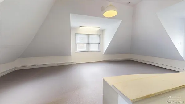 a room with furniture and window