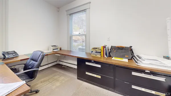 a utility room with sink and a vanity