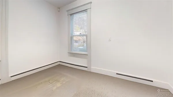 a bathroom with a sink and toilet