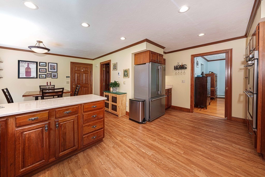 47 Southboro Road Upton, MA 01568 - Photo 10 of 42 a kitchen with stainless steel appliances granite countertop a refrigerator and a stove top oven