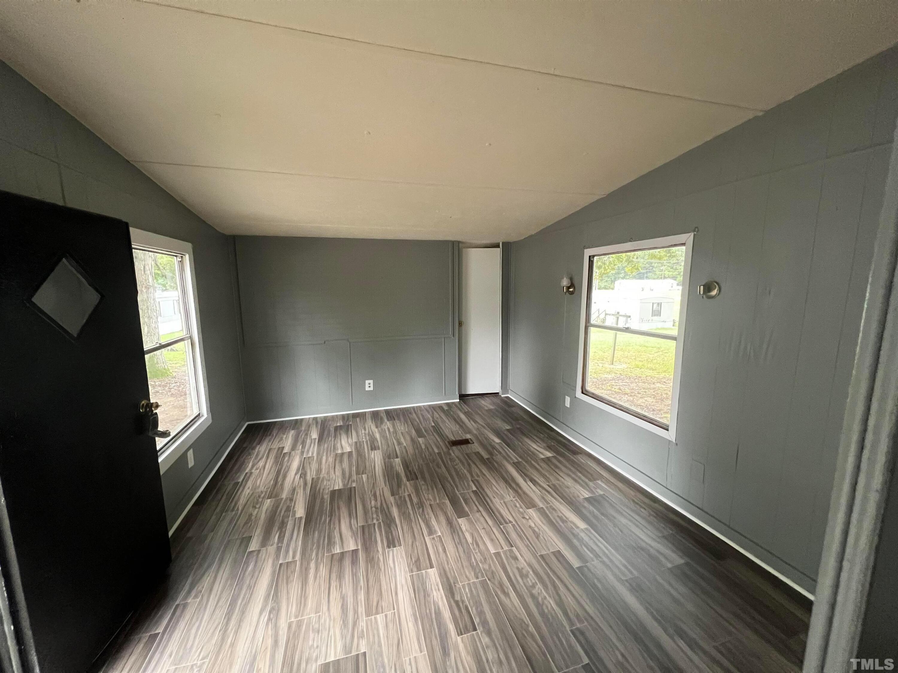 38 Pine Forest Loop Louisburg, NC 27549 - Photo 2 of 9 a view of an empty room and a window