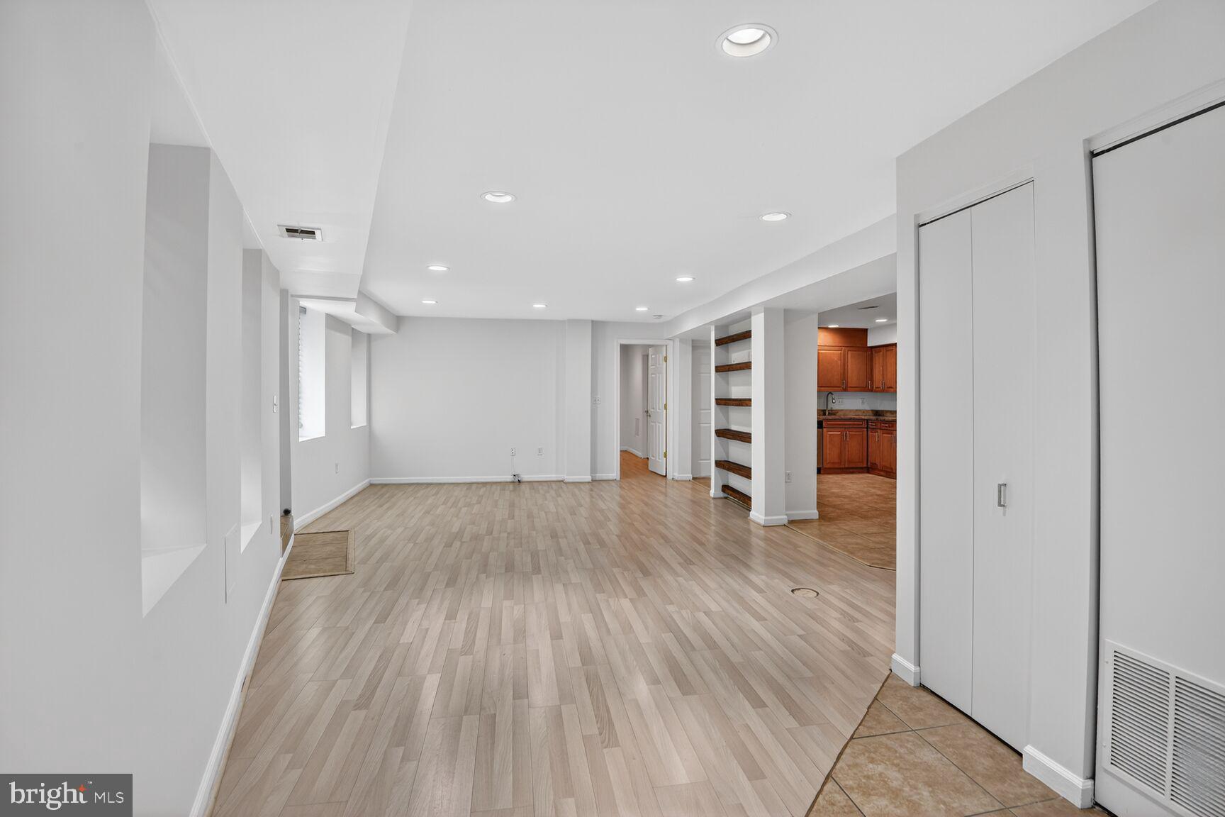 424 Q Street Northwest, Unit A Washington, DC 20001 - Photo 2 of 15 a view of empty room with wooden floor