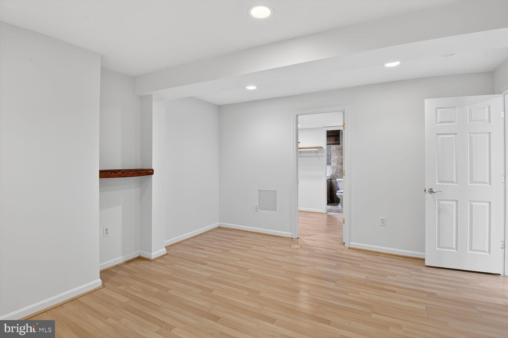 424 Q Street Northwest, Unit A Washington, DC 20001 - Photo 10 of 15 a view of empty room with wooden floor