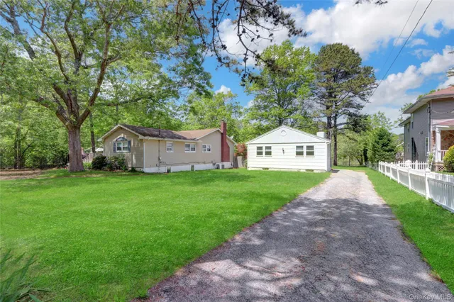 a view of a back yard with green space