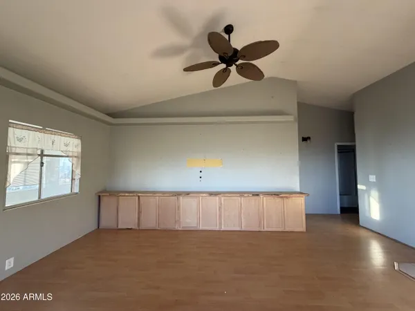 a view of an empty room and window