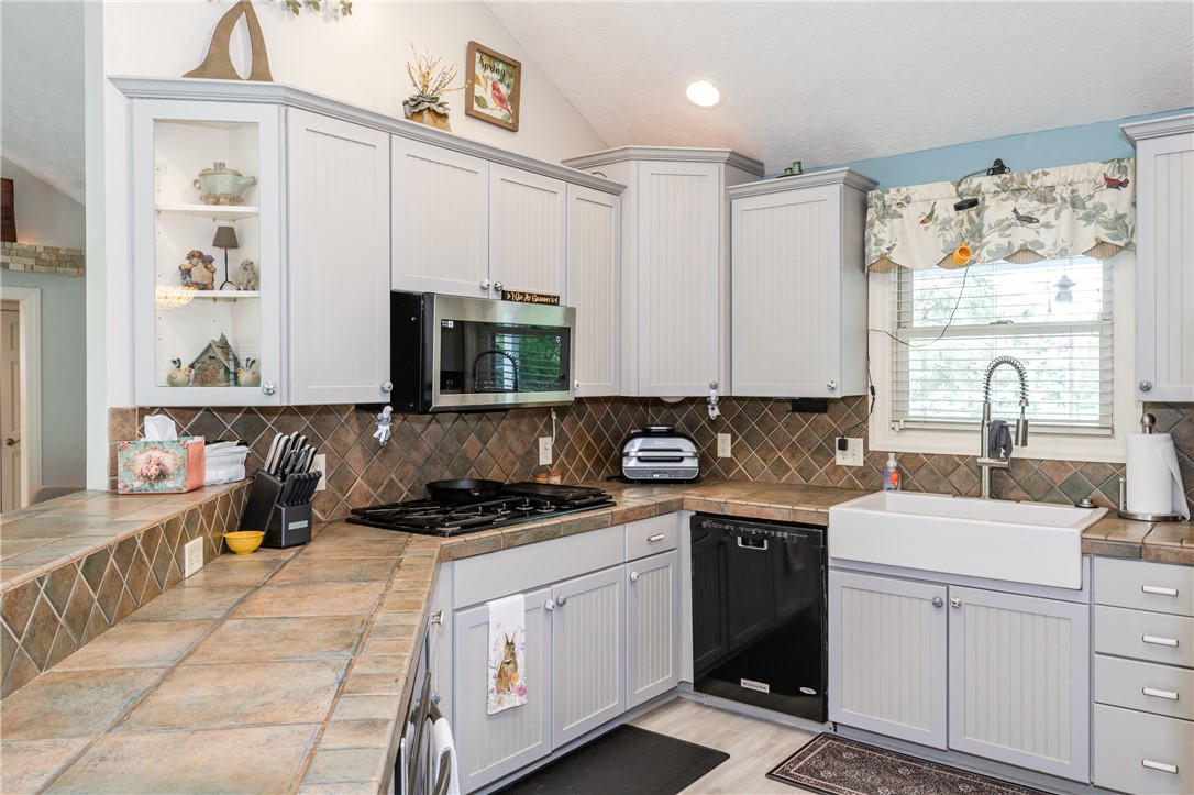 159 East Lytle 5 Points Road Springboro, OH 45066 - Photo 8 of 45 This kitchen offers modern amenities and a functional layout, perfect for everyday living.