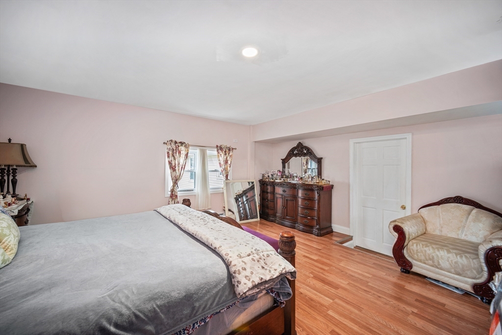 12 Dodge Road Brockton, MA 02302 - Photo 11 of 18 a bedroom with a bed and a dresser