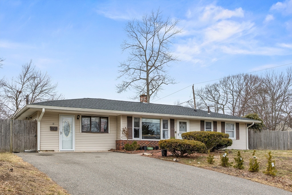 12 Dodge Road Brockton, MA 02302 - Photo 2 of 18 a front view of a house with cars parked