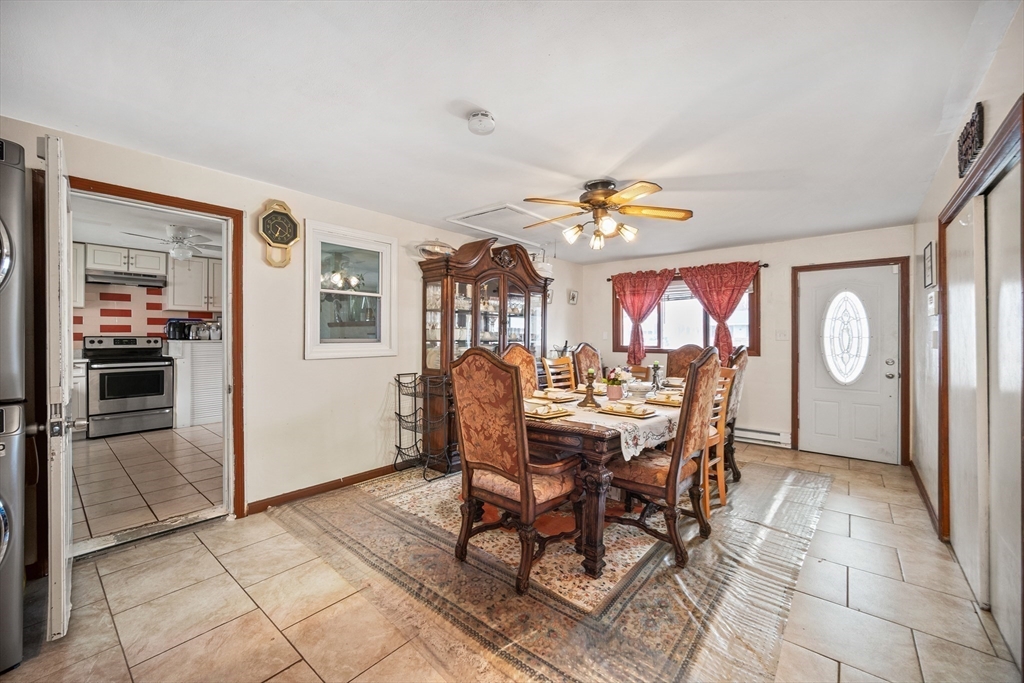 12 Dodge Road Brockton, MA 02302 - Photo 9 of 18 a view of a dining room with furniture and chandelier
