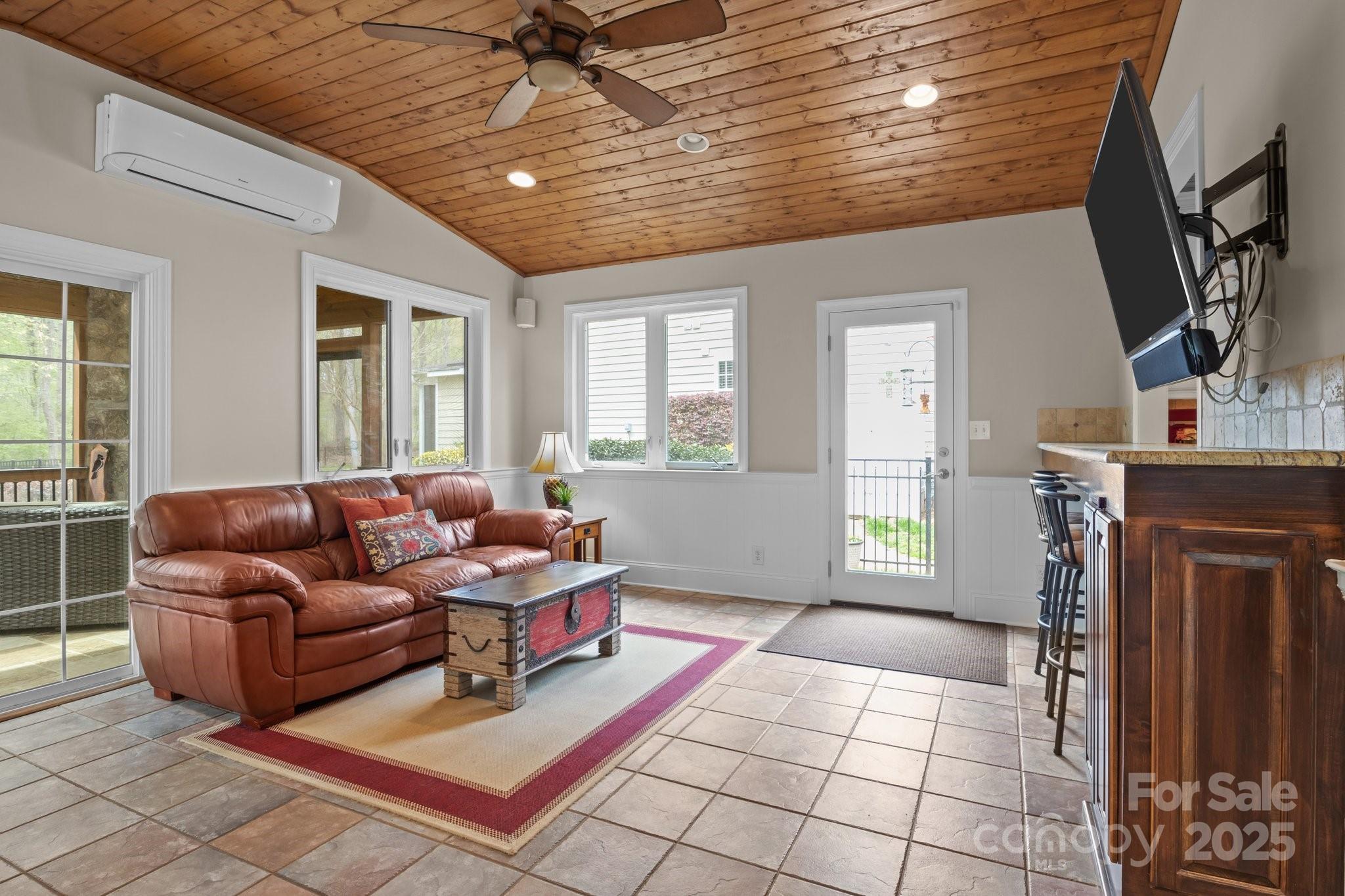 7710 Epping Forest Drive Huntersville, NC 28078 - Photo 13 of 37 a living room with furniture and a fireplace