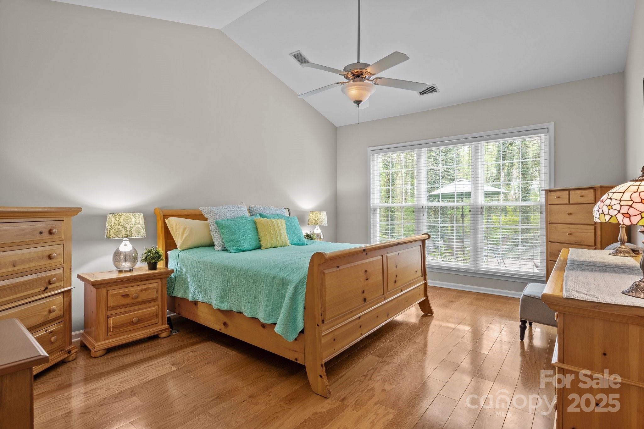 7710 Epping Forest Drive Huntersville, NC 28078 - Photo 18 of 37 a bed room with a bed and a chair