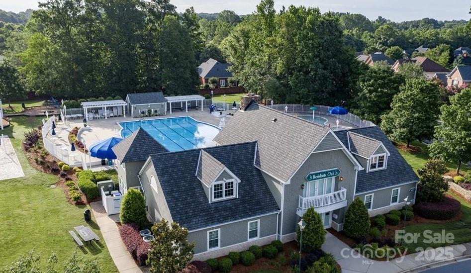 7710 Epping Forest Drive Huntersville, NC 28078 - Photo 28 of 37 an aerial view of a house with roof deck and outdoor seating