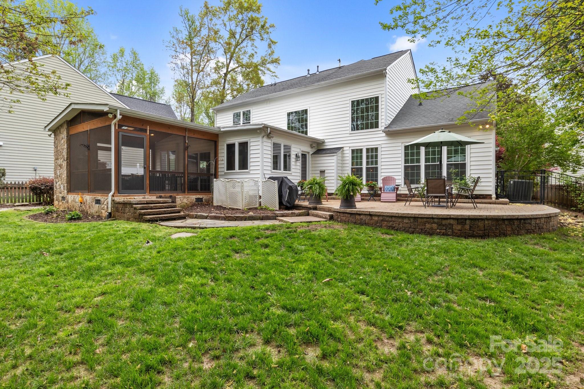 7710 Epping Forest Drive Huntersville, NC 28078 - Photo 3 of 37 a front view of house with yard and seating area