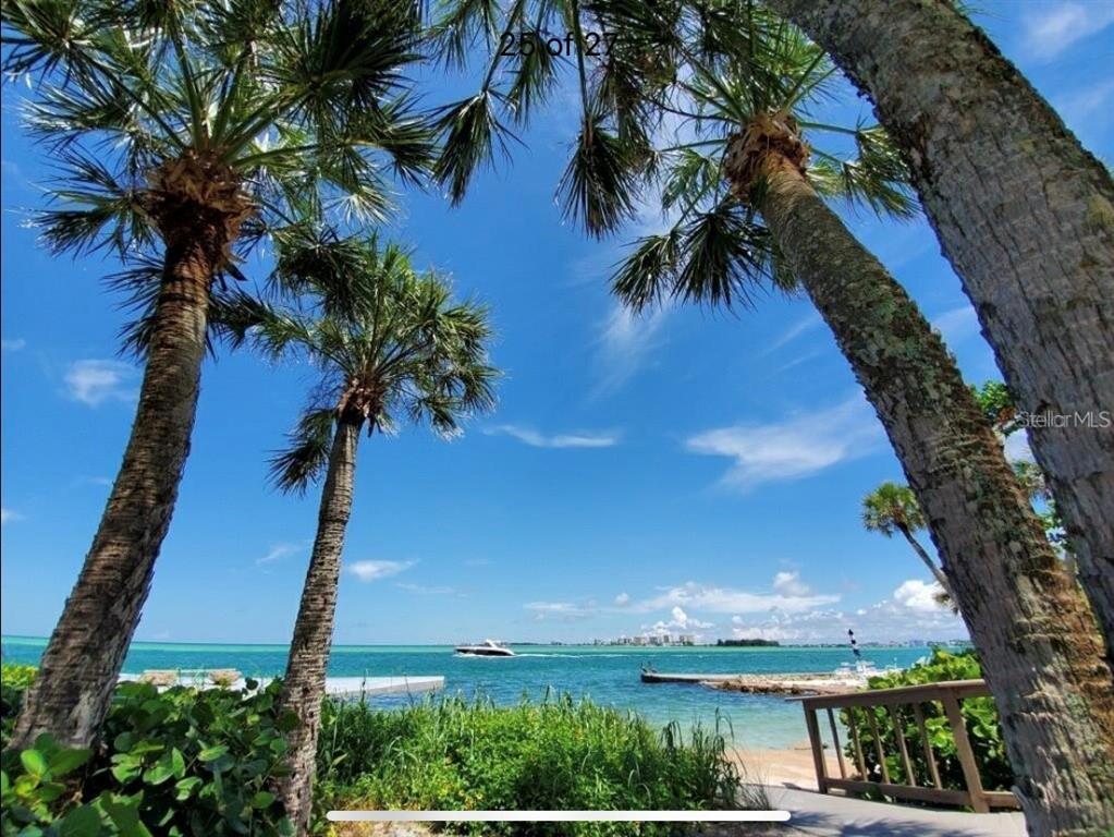 111 Pass Key Road, Unit 111 Sarasota, FL 34242 - Photo 20 of 23 an aerial view of a house with a yard