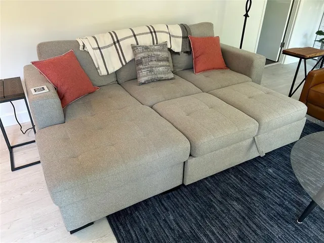 a bedroom with furniture and a couch