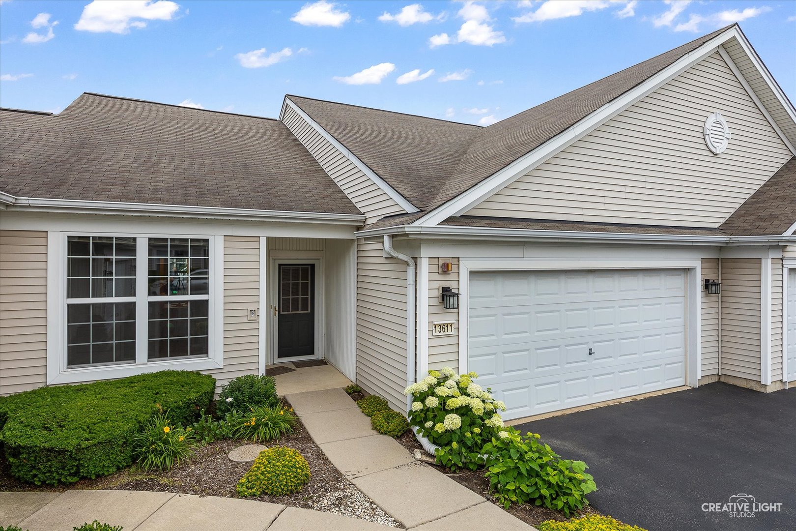 13611 Hemlock Road Huntley, IL 60142 - Photo 1 of 16 a front view of a house