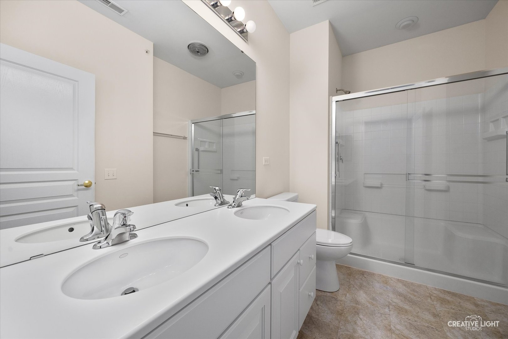 13611 Hemlock Road Huntley, IL 60142 - Photo 12 of 16 a bathroom with a sink toilet and shower