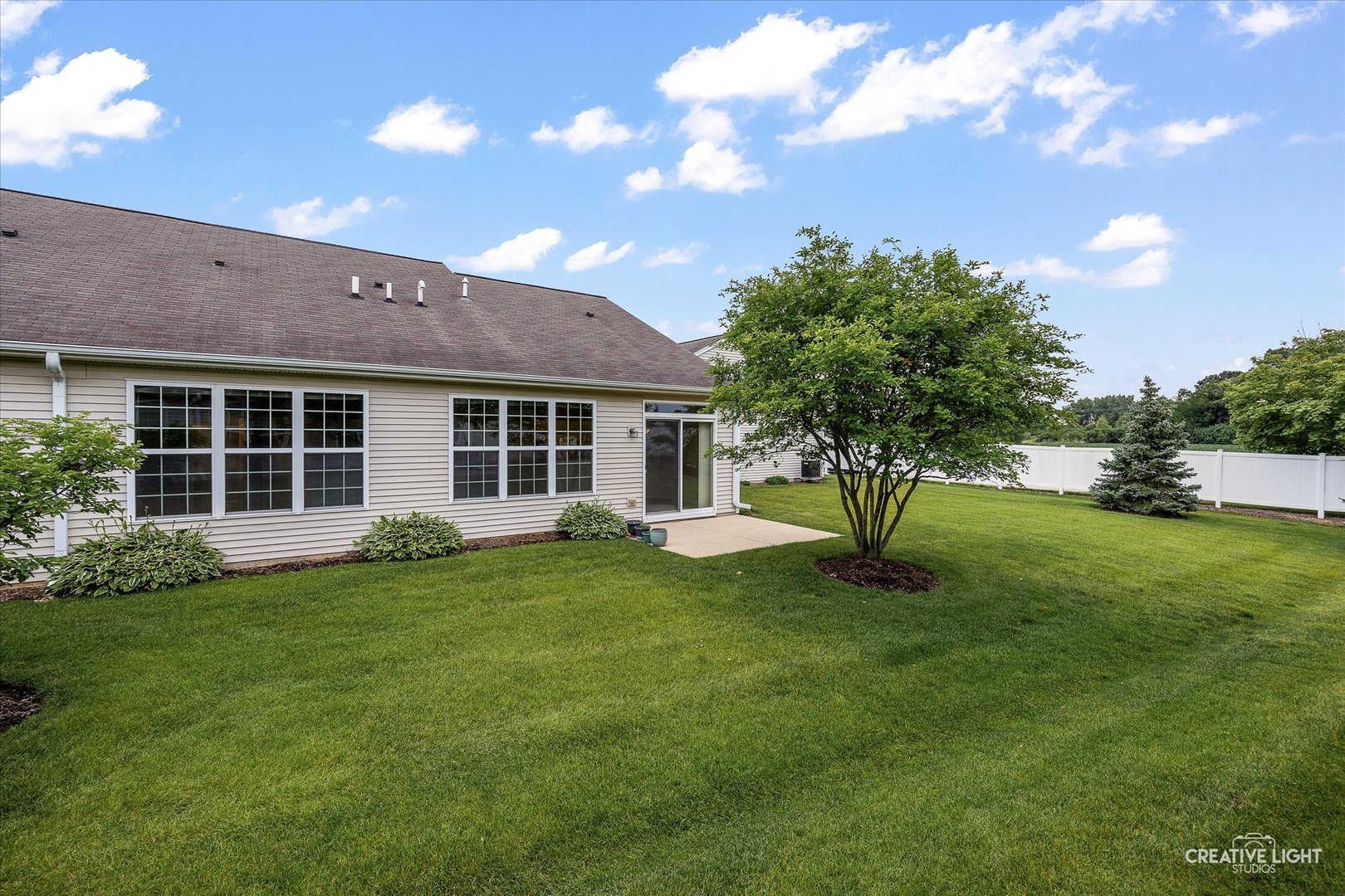 13611 Hemlock Road Huntley, IL 60142 - Photo 16 of 16 a view of a house with a back yard