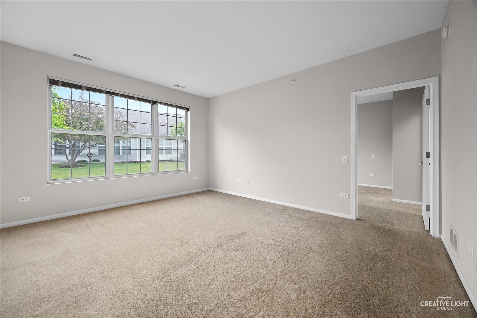13611 Hemlock Road Huntley, IL 60142 - Photo 9 of 16 an empty room with windows