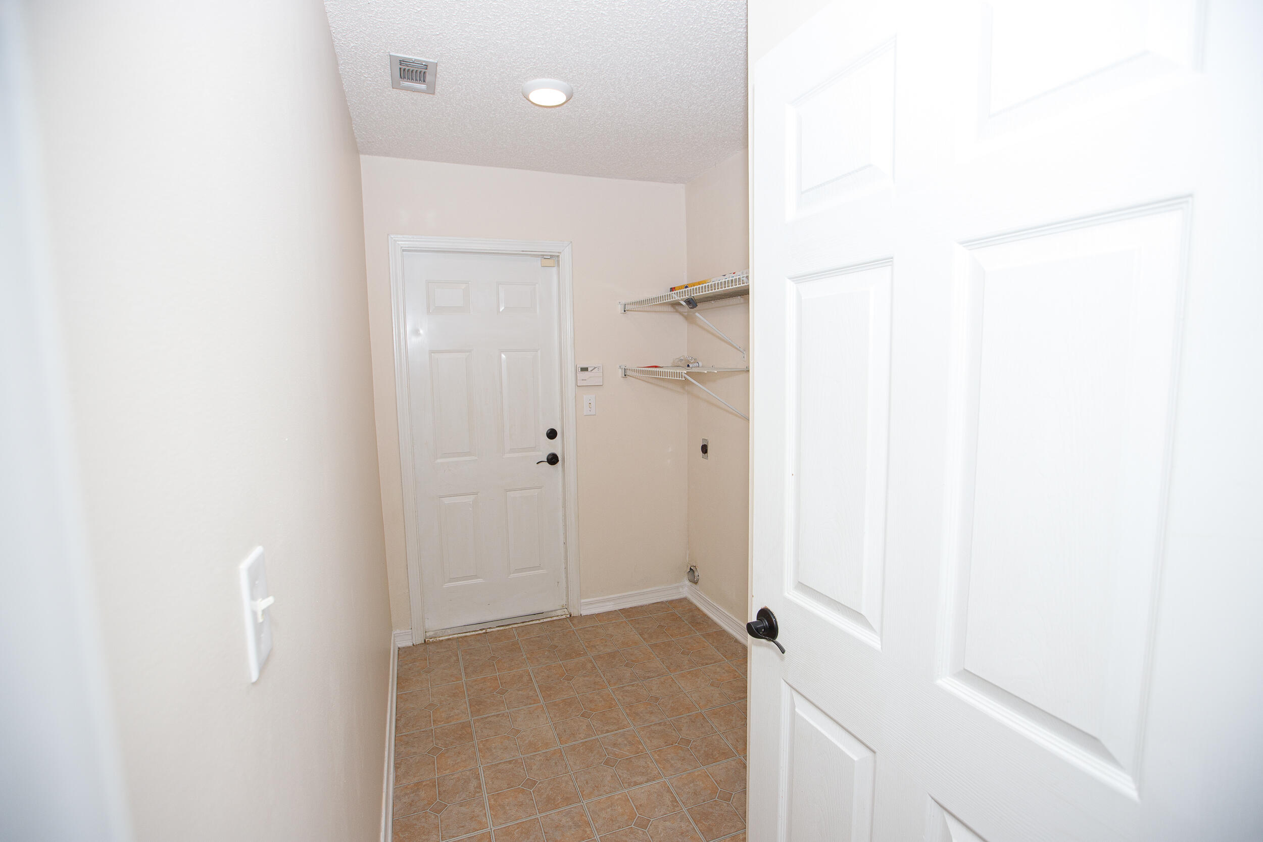 1305 Jefferyscot Court Crestview, FL 32536 - Photo 16 of 20 a view of a bathroom with a shower