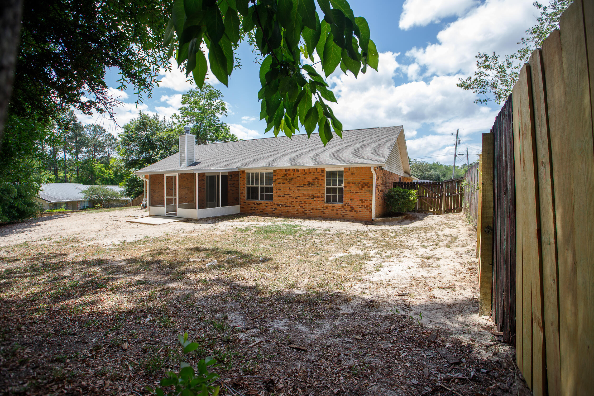 1305 Jefferyscot Court Crestview, FL 32536 - Photo 20 of 20 a view of a house with a yard
