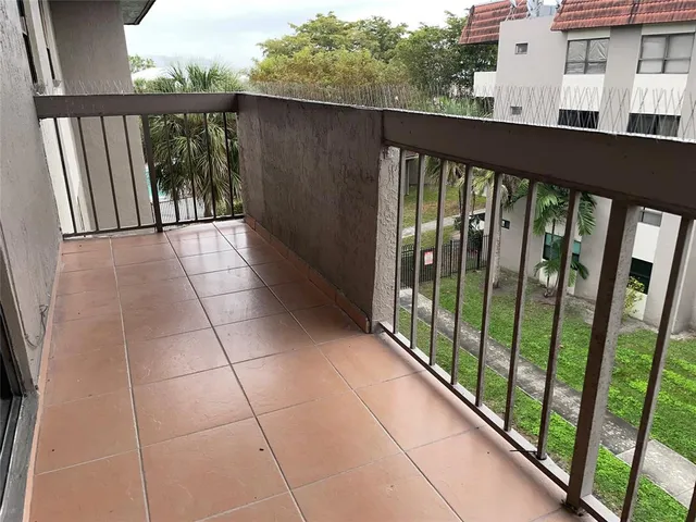 a view of a backyard with a garden