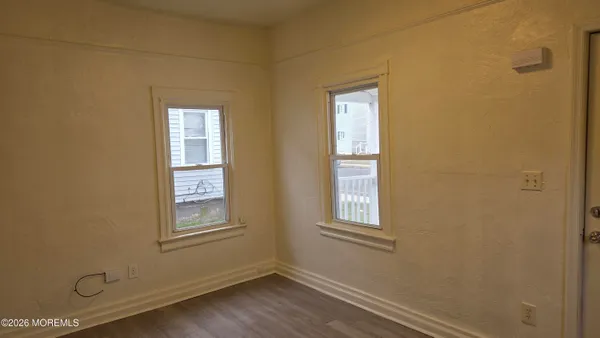 a view of a room that has a window in it