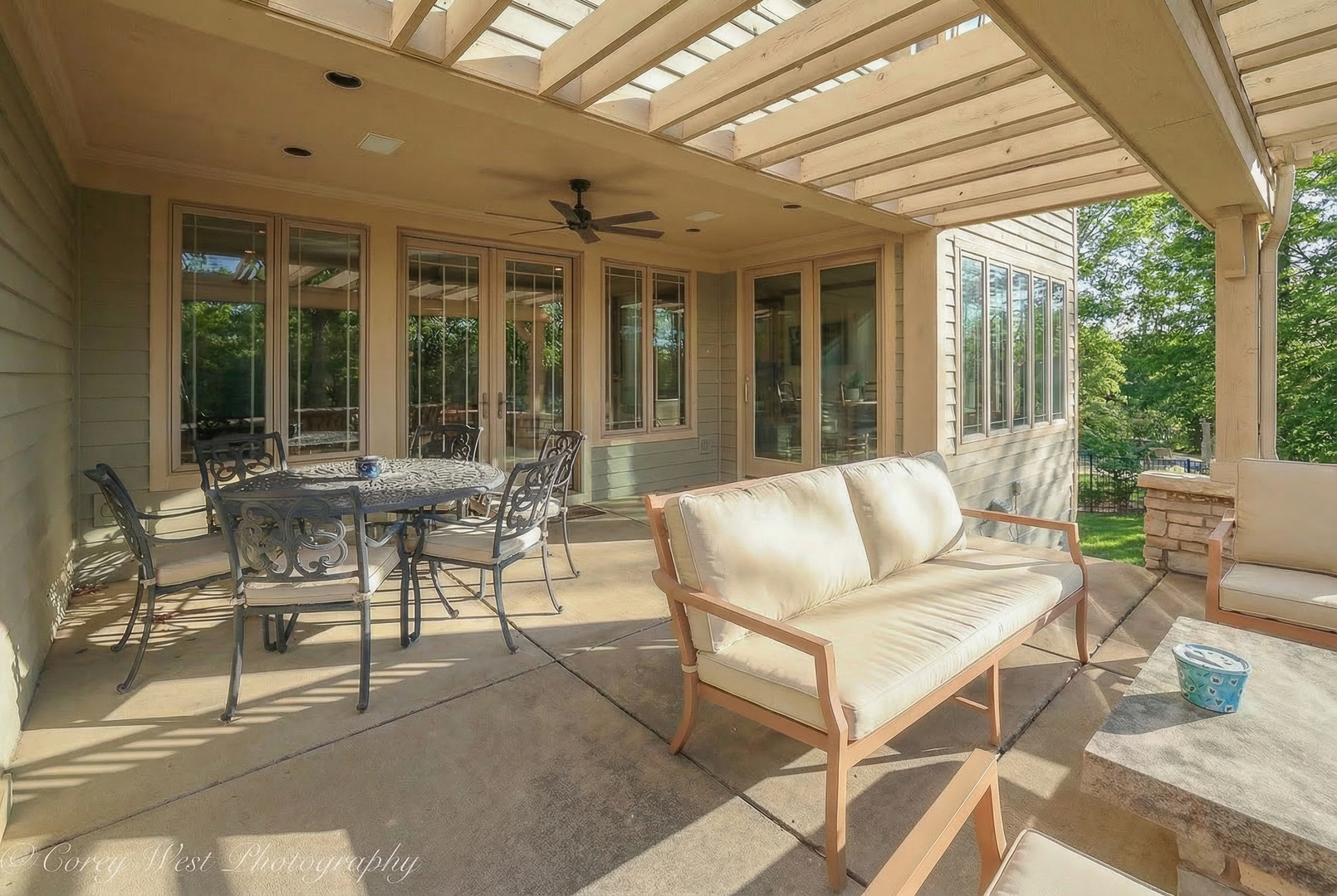 N004 Alexander Drive Geneva, IL 60134 - Photo 69 of 75 a view of a patio with couches table and chairs and potted plants