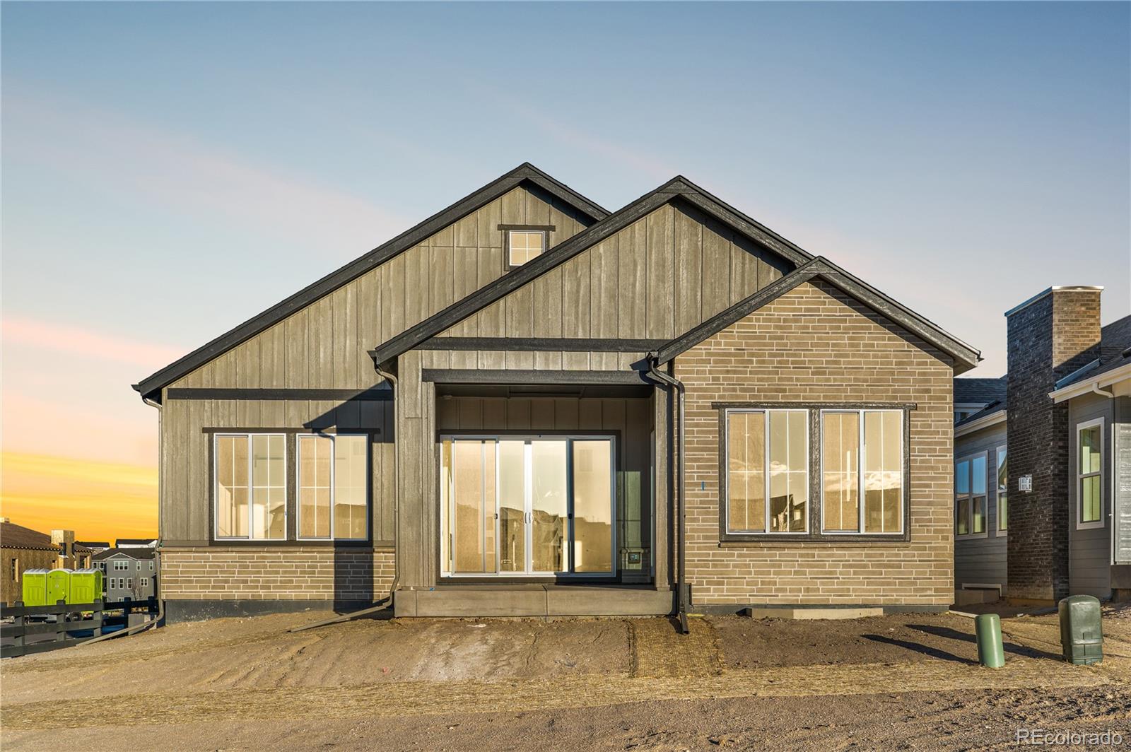 6749 Fawn Path Lane Castle Pines, CO 80108 - Photo 2 of 33 a front view of a house