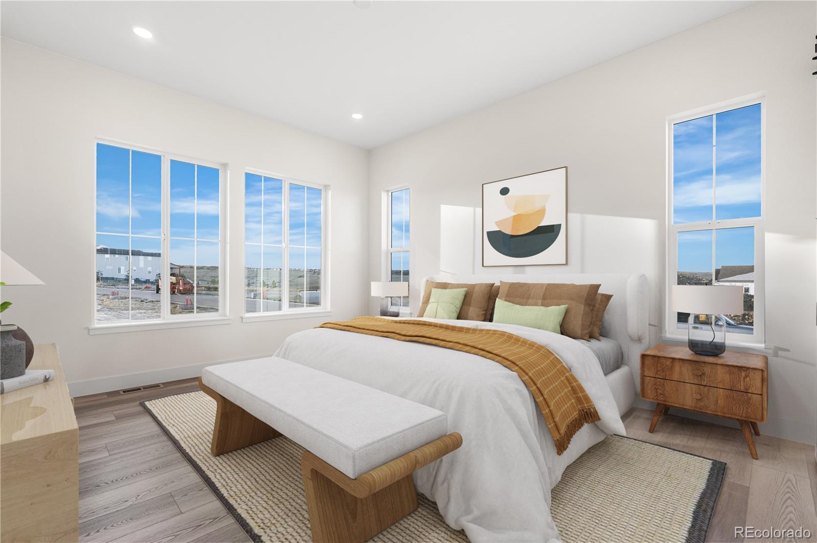 6749 Fawn Path Lane Castle Pines, CO 80108 - Photo 23 of 33 a bedroom with a bed and a large window