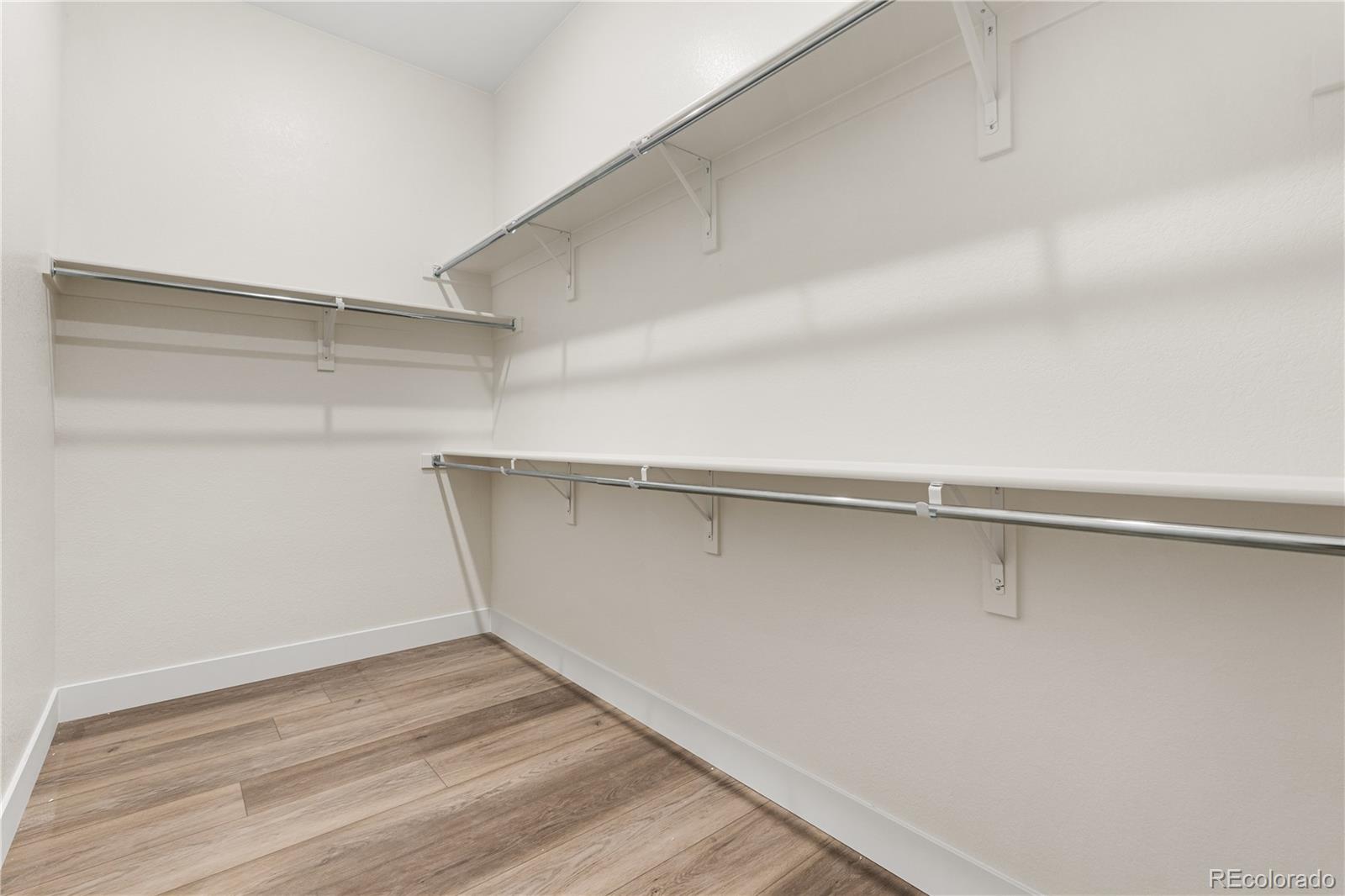 6749 Fawn Path Lane Castle Pines, CO 80108 - Photo 25 of 33 a view of a room with shelf on the wall