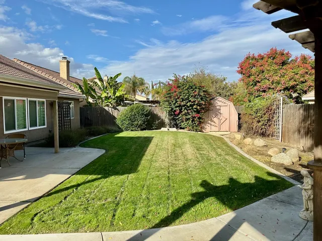 a view of a garden with an outdoor space