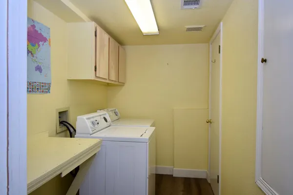 a view of room with a ceiling fan and window
