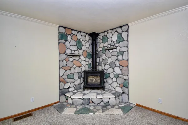a view of a porch with wooden floor