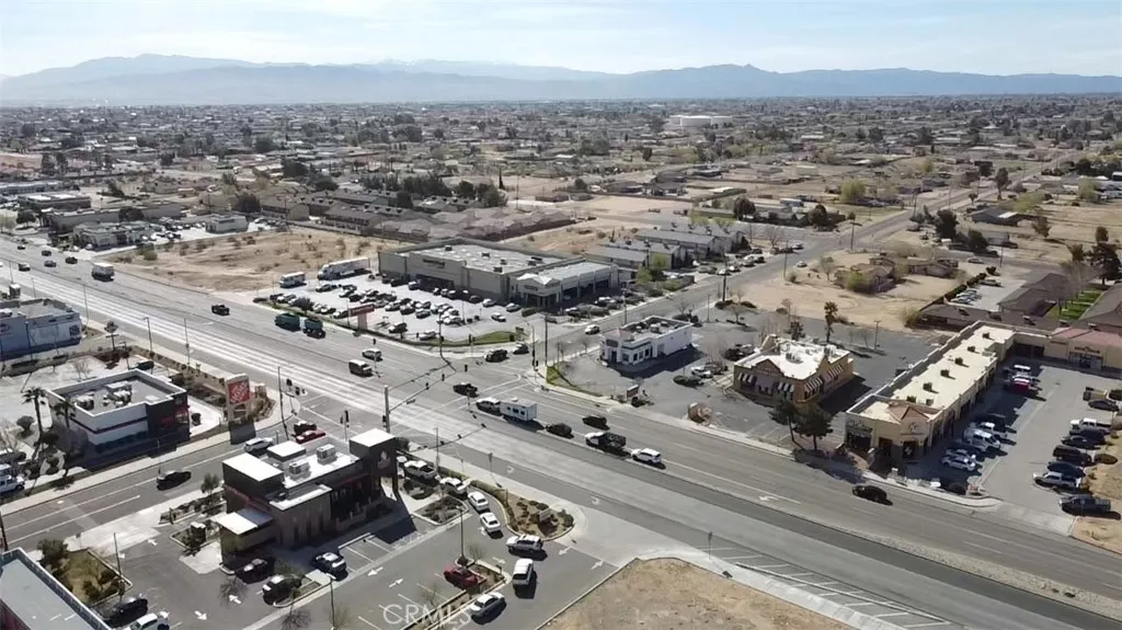 406031 Bear Valley Road Hesperia, CA 92345 - Photo 2 of 8 an aerial view of a city