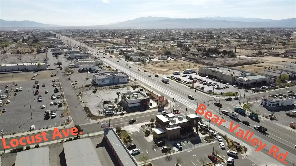 406031 Bear Valley Road Hesperia, CA 92345 - Photo 3 of 8 an aerial view of a city