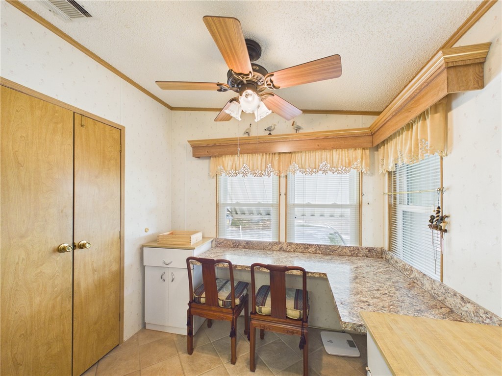1203 Calusa Drive Sebastian, FL 32976 - Photo 13 of 27 a view of a livingroom with furniture and window