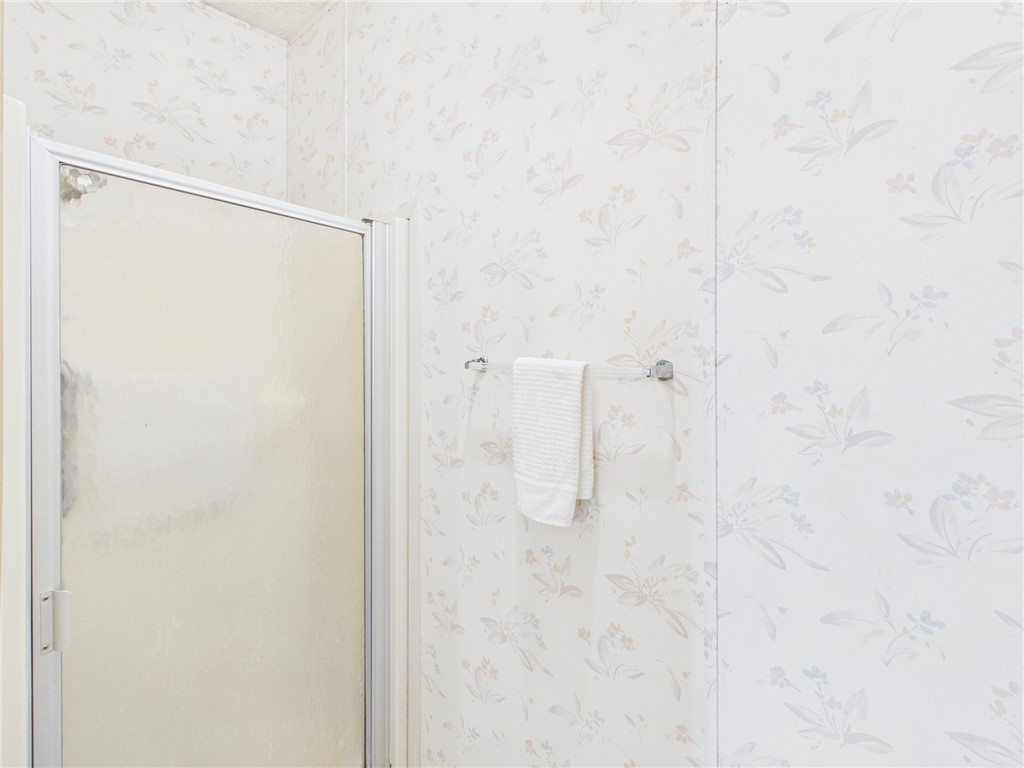 1203 Calusa Drive Sebastian, FL 32976 - Photo 19 of 27 a bathroom with a shower