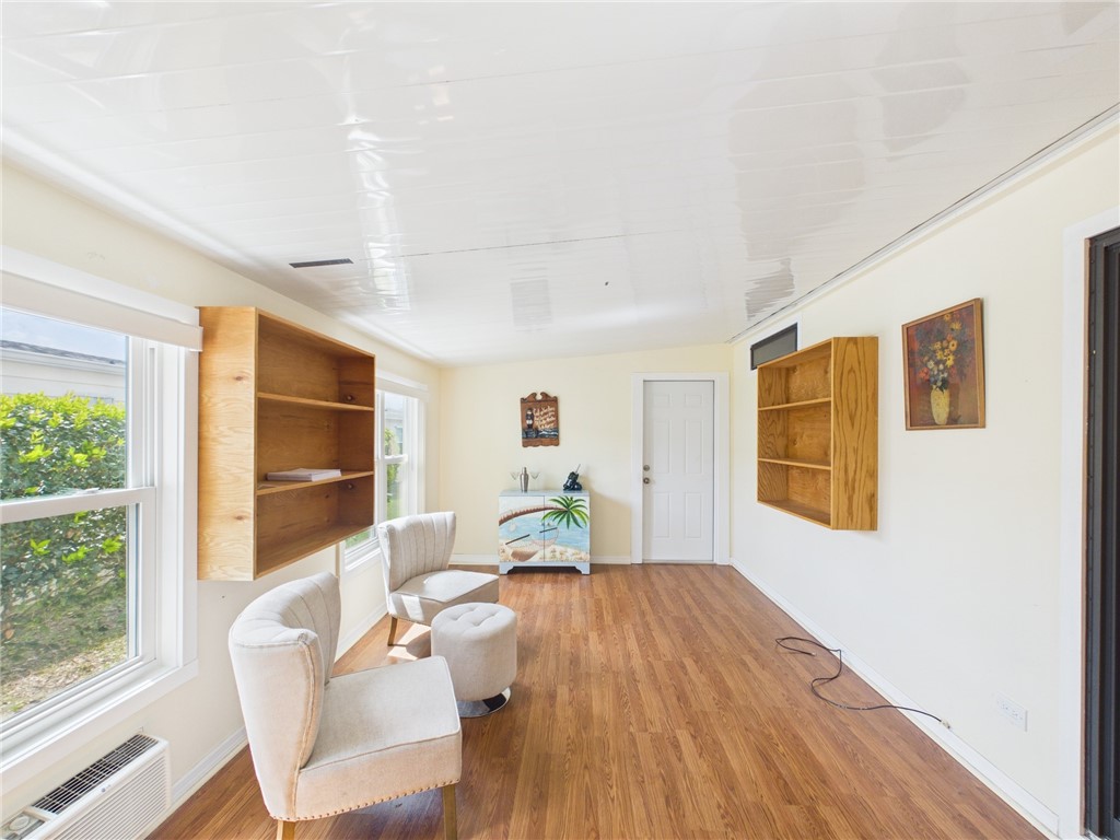 1203 Calusa Drive Sebastian, FL 32976 - Photo 26 of 27 a living room with furniture and a window