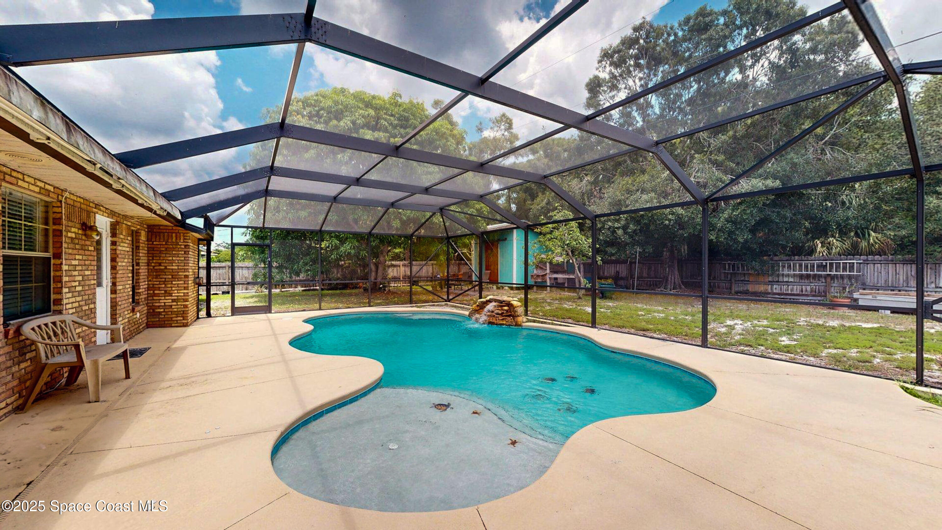 2832 School Drive Palm Bay, FL 32905 - Photo 39 of 55 a view of a swimming pool with a patio