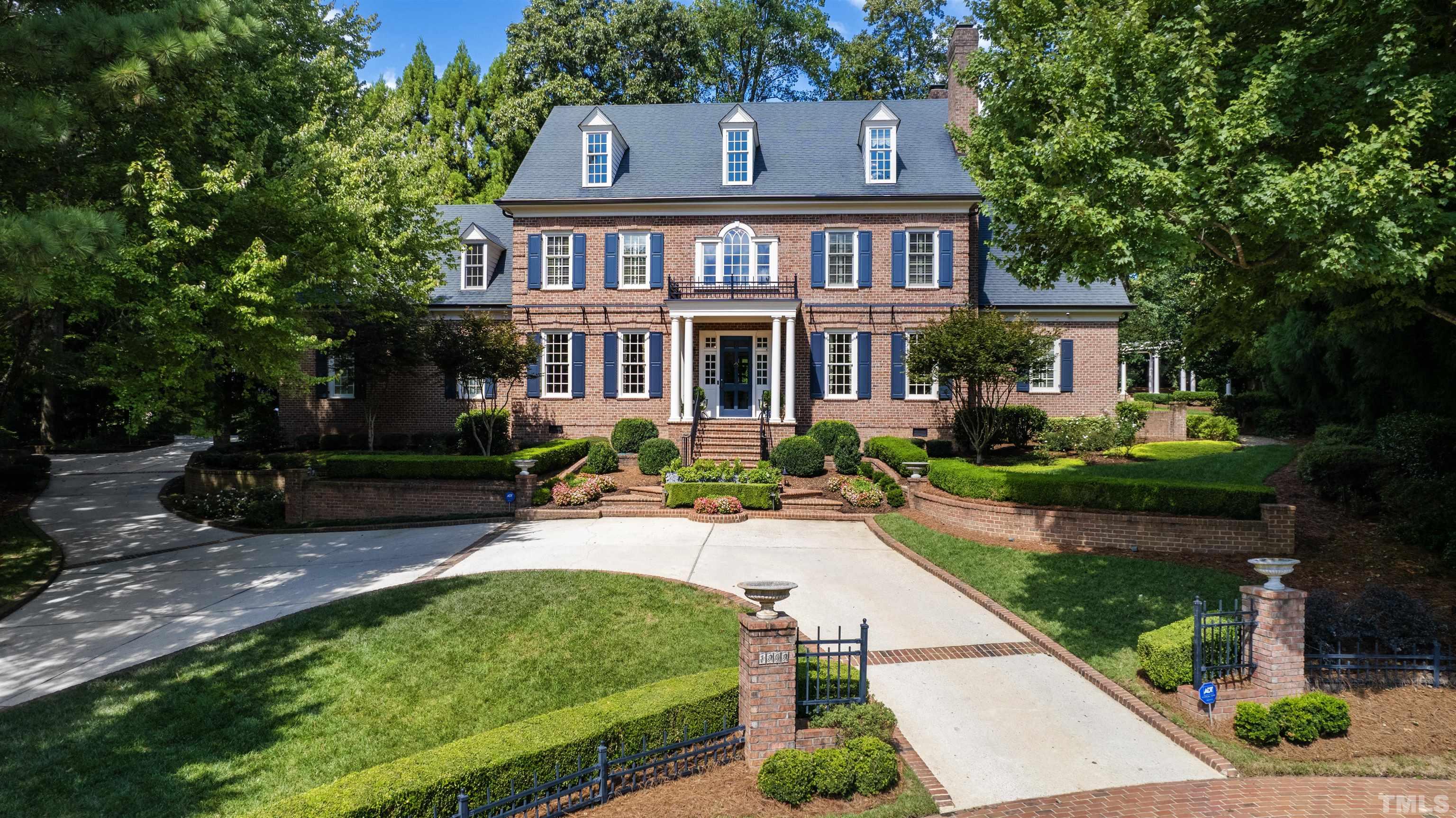 1909 Chase Court Raleigh, NC 27607 - Photo 2 of 87 front view of a house with a yard