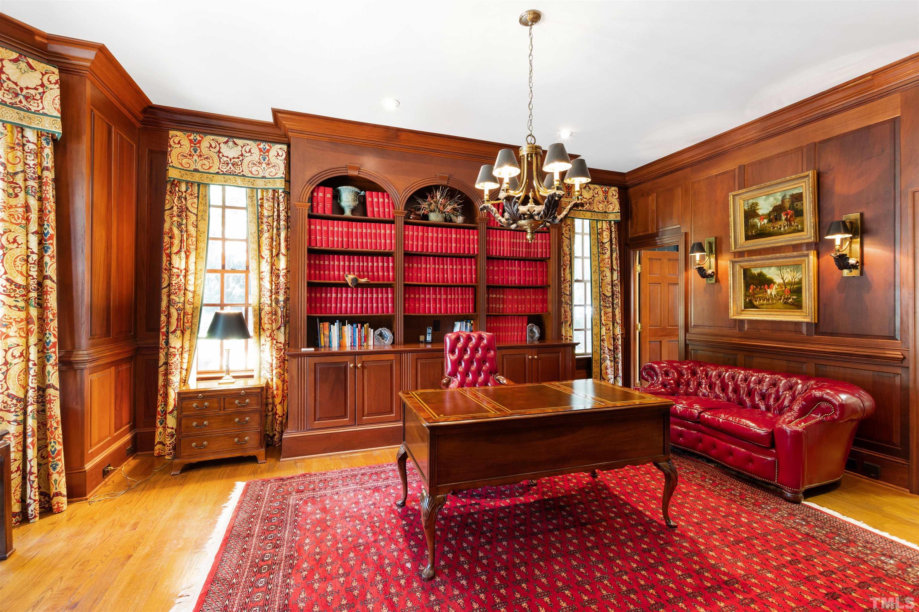 1909 Chase Court Raleigh, NC 27607 - Photo 29 of 87 a living room with furniture a rug and a window