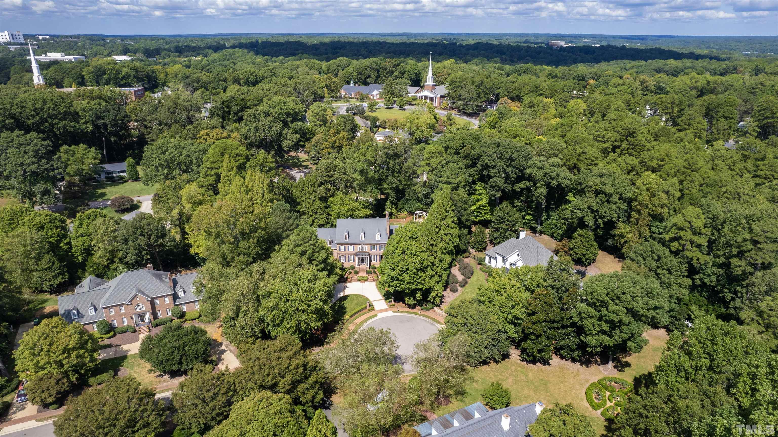 1909 Chase Court Raleigh, NC 27607 - Photo 75 of 87 an aerial view of a house with a yard