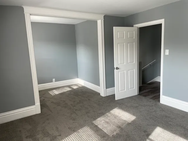 an empty room with window