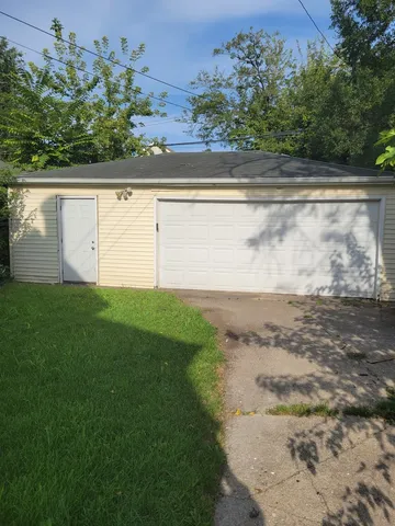 a view of a yard with an outdoor space