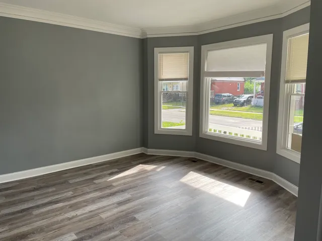 a view of an empty room and window