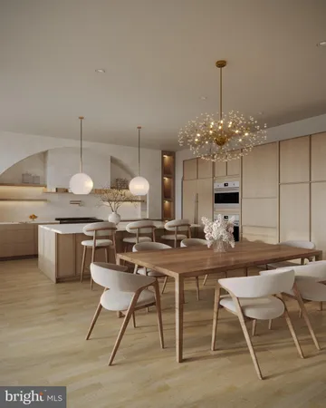 a view of a livingroom with furniture and a large window