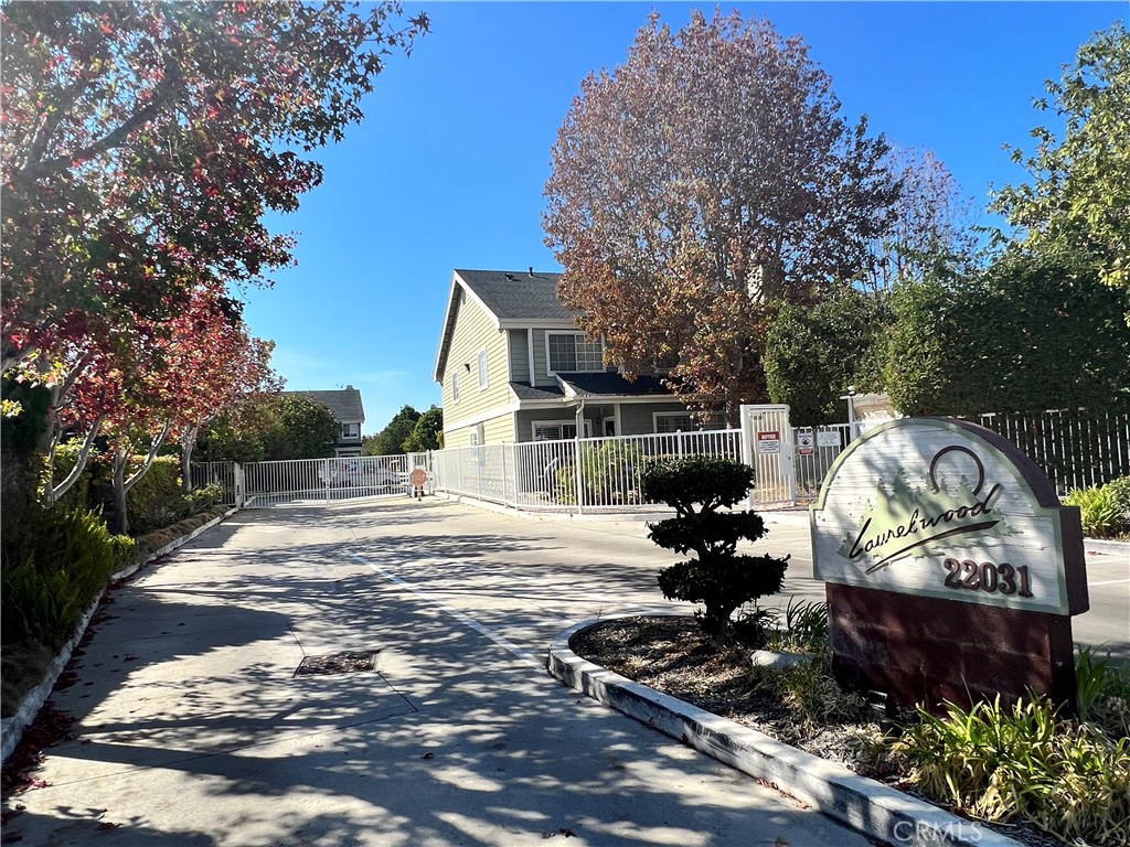 22031 Main, Unit 10 Carson, CA 90745 - Photo 3 of 10 a backyard of a house with lots of green space